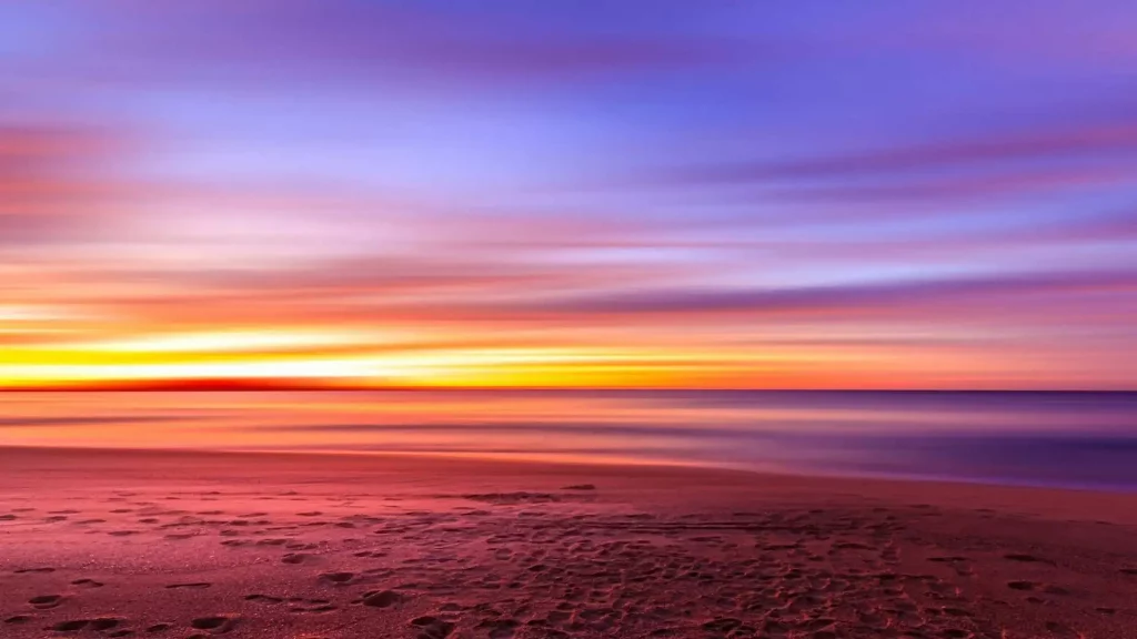 The Ultimate Guide to Summer Travel: Hacks for Your Life & Wallet 5 Beach sunset